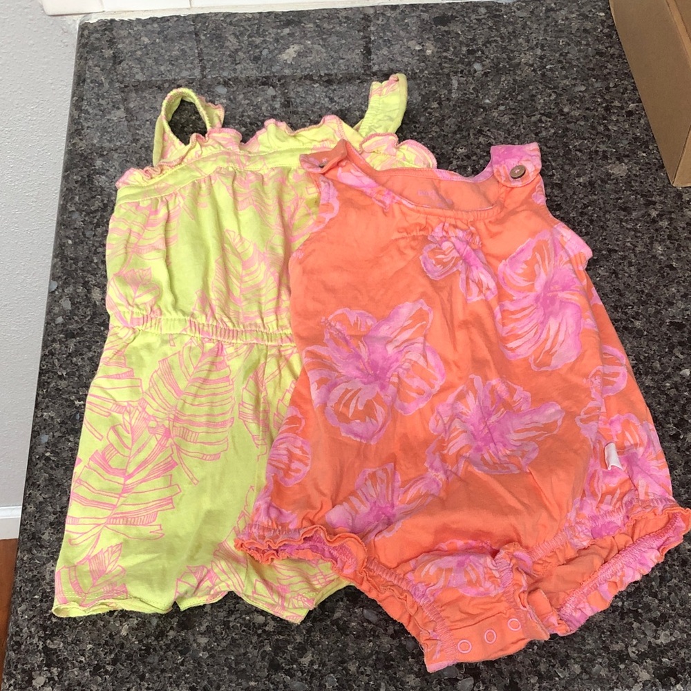 Two floral Burt’s Bees Rompers size 18 months